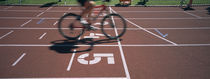 Low section view of a man cycling on sports track, Kirchzarten, Germany von Panoramic Images