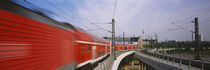 Train on railroad tracks, Central Station, Berlin, Germany by Panoramic Images
