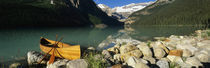 Canoe at the lakeside, Lake Louise, Banff National Park, Alberta, Canada by Panoramic Images