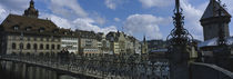 Bridge across a river, Lucerne, Switzerland by Panoramic Images