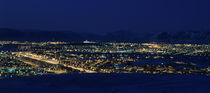 High angle view of city lit up at night, Reykjavik, Iceland by Panoramic Images