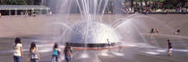 Children playing near a fountain, Seattle, King County, Washington State, USA by Panoramic Images