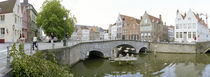 Bridge across a channel, Bruges, West Flanders, Belgium by Panoramic Images