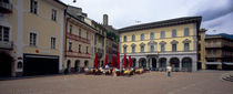 Group of people at a sidewalk cafe, Town Center, Bellinzona, Ticino, Switzerland by Panoramic Images