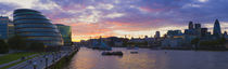 City hall with office buildings at sunset, Thames River, London, England by Panoramic Images