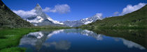 Reflection of mountains in water, Riffelsee, Matterhorn, Switzerland by Panoramic Images