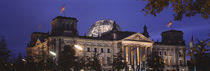 Facade of a building at dusk, The Reichstag, Berlin, Germany by Panoramic Images