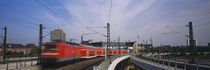 Train on railroad tracks, Central Station, Berlin, Germany by Panoramic Images