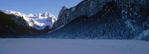 Mountains with a frozen lake, Lake Gosau, Dachstein Mountains, Austria by Panoramic Images