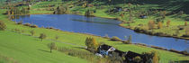  Lake Huttensee, Aerial view of cottages around a lake von Panoramic Images