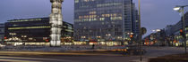 Buildings in a city lit up at dusk, Sergels Torg, Stockholm, Sweden von Panoramic Images