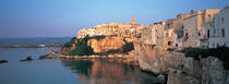 Buildings at the coast, Vieste, Gargano, Apulia, Italy by Panoramic Images