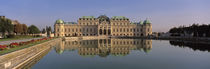 Belvedere Palace, View of a manmade lake outside a vintage building by Panoramic Images
