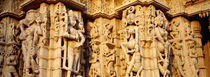 Sculptures carved on a wall of a temple, Jain Temple, Ranakpur, Rajasthan, India by Panoramic Images