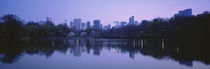 USA, New York State, New York City, Central Park Lake, Skyscrapers in a city von Panoramic Images