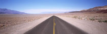 USA, California, Death Valley, Empty highway in the valley by Panoramic Images