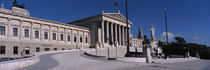 Statue in front of a government building, Parliament Building, Vienna, Austria by Panoramic Images