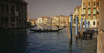 Tourists sitting in a gondola, Grand Canal, Venice, Italy by Panoramic Images