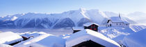 Snow Covered Chapel and Chalets Swiss Alps Switzerland von Panoramic Images