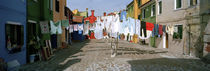 Clothesline in a street, Burano, Veneto, Italy by Panoramic Images