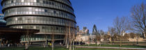 Buildings in a city, Sir Norman Foster Building, London, England by Panoramic Images