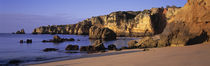 Portugal, Lagos, Algarve Region, Panoramic view of the beach and coastline by Panoramic Images