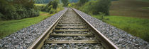 Railroad track passing through a landscape, Germany by Panoramic Images