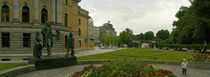 Statues in front of a theater building, National Theater, Oslo, Norway by Panoramic Images