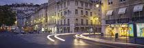 Traffic on a road, Praca de Figueira, Lisbon, Portugal by Panoramic Images