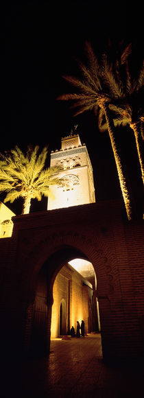 Low angle view of a mosque lit up at night, Koutoubia Mosque, Marrakesh, Morocco by Panoramic Images