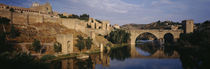 Castle at the waterfront, Puente de San Martin, Tajo River, Toledo, Spain von Panoramic Images