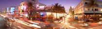 Traffic on a road, Ocean Drive, Miami, Florida, USA by Panoramic Images