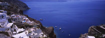 High angle view of a town at the waterfront, Oia, Santorini, Greece by Panoramic Images