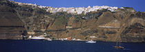 Town on a hill at the waterfront, Fira, Santorini, Greece by Panoramic Images