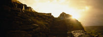 Silhouette of a cave at sunset, Ailwee Cave, County Clare, Republic Of Ireland by Panoramic Images