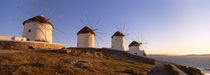 Low angle view of traditional windmills, Mykonos, Cyclades Islands, Greece von Panoramic Images