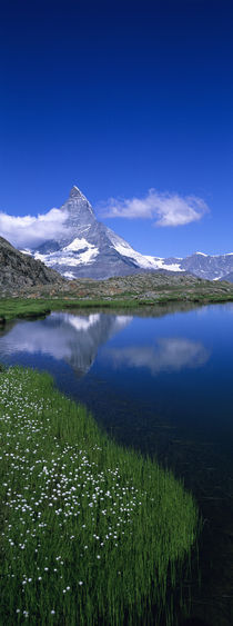 Reflection of a mountain in water, Riffelsee, Matterhorn, Switzerland by Panoramic Images