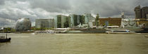 Buildings at the waterfront, Thames River, London, England by Panoramic Images
