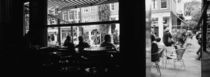 Tourists In A Cafe, Amsterdam, Netherlands by Panoramic Images