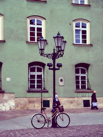 A street lamp and a bike by Magdalena  Dudka