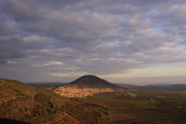 A view of Jezreel valley and Mount Tabor at dusk by Hanan Isachar