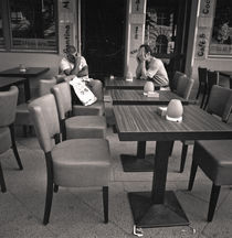 Two menn at a cafe: Berlin by Ron Greer