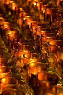 Votive candles by John Greim