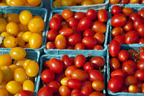 Cherry tomatoes at farmers market. by John Greim