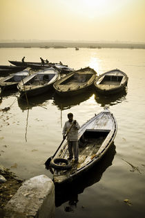Boatman on the River Ganges by Russell Bevan Photography
