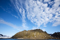 Clouds above steep cliffs along Spitsbergen Island in Albert I Land on summer evening von Danita Delimont