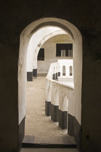 View of Cape Coast Castle from doorway by Danita Delimont