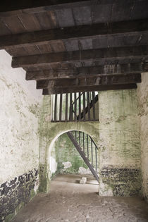 Interior of slave holding cell at Cape Coast Castle by Danita Delimont