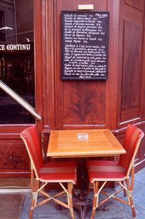 Two chairs in front of a Parisian bistro by Danita Delimont