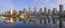 Looking across False Creek at the skyline of Vancouver British Columbia at sunrise by Danita Delimont